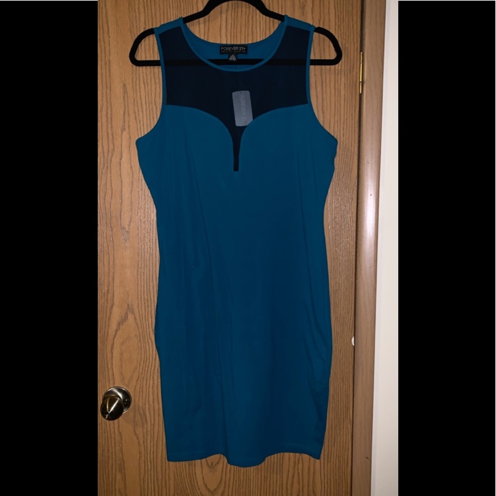 Teal dress with mesh inset.